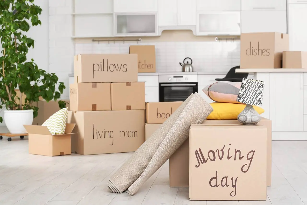 Professional mover wrapping furniture for long distance move in Atlanta, GA