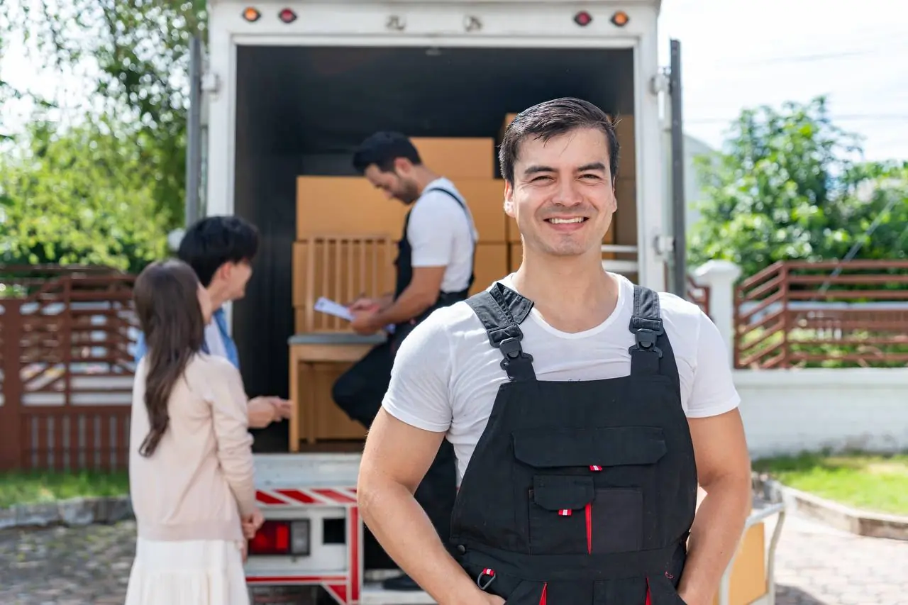 Professional movers preparing and packing for interstate move